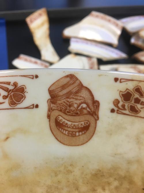 A piece of diningware found in Kenmore dating back to a Prohibition-era Seattle restaurant, the Coon Chicken Inn. 