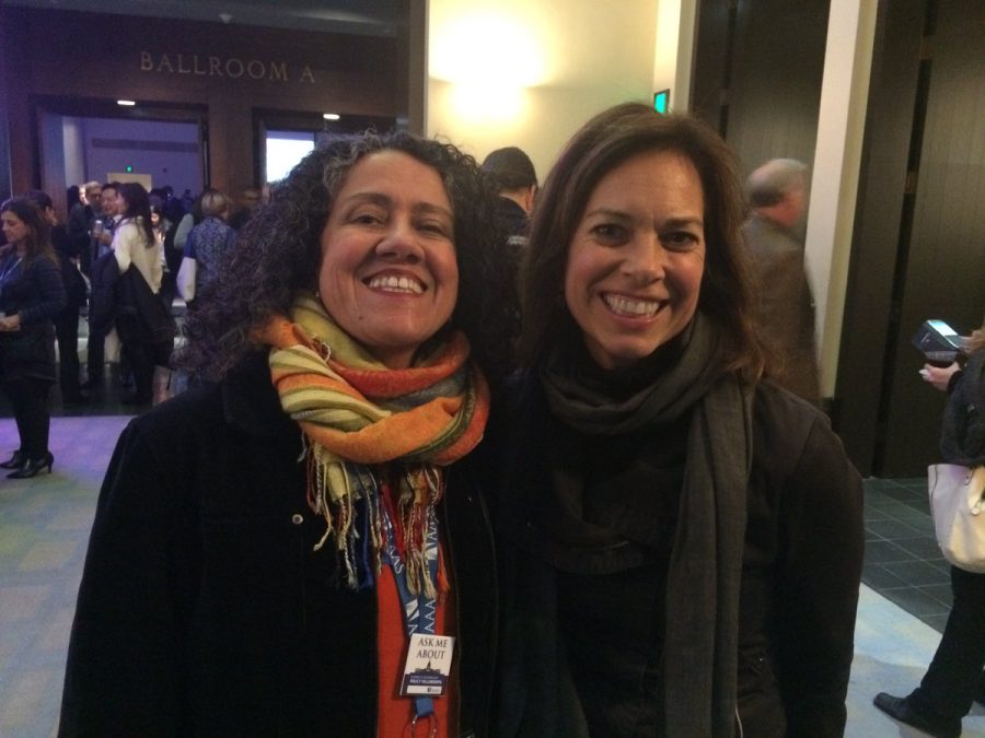 Dr. Astrid Caldas (left) poses for a photo with Lisa Palmer (right) at the 2017 American Association for the Advancement of Science annual meeting.