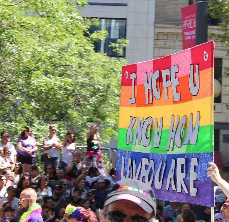 Members of the LGBT community marching in the 2018 Seattle Pride Parade