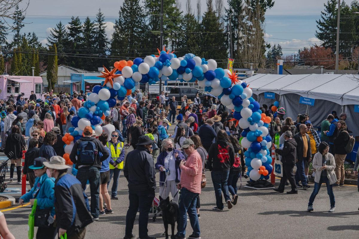 Revelers flood the Edmonds campus to celebrate the opening of Community Transits new Orange Line bus stop at the school.